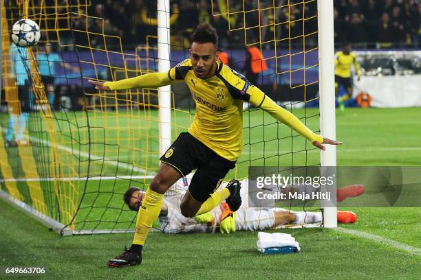 Pierre-Emerick Aubameyang of Borussia Dortmund celebrates after he headers the ball to score the first goal of the ganme during the UEFA Champions...