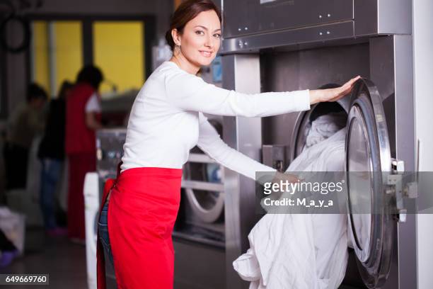 at laundry service. - tumble dryer sheets stock pictures, royalty-free photos & images