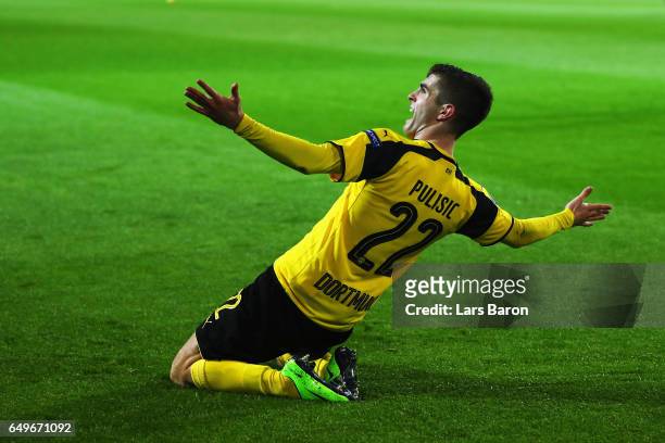 Christian Pulisic of Borussia Dortmund celebrates after he shoots and scores his teams second goal during the UEFA Champions League Round of 16...