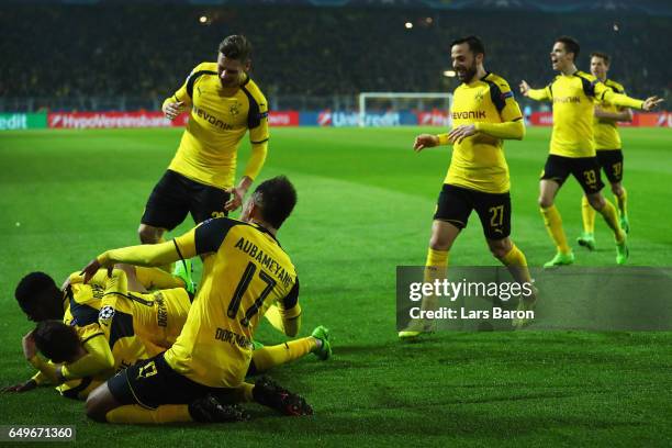 Christian Pulisic of Borussia Dortmund celebrates after he shoots and scores his teams second goal with team mates during the UEFA Champions League...