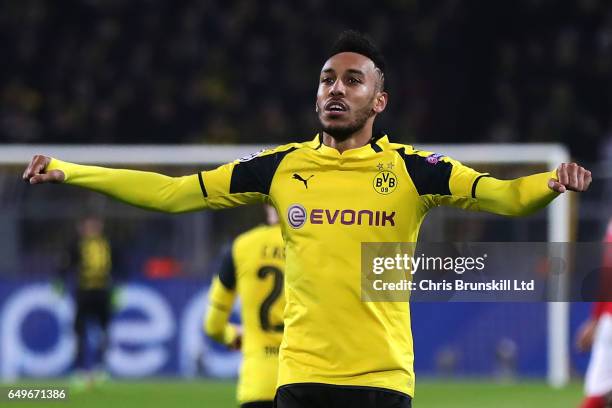 Pierre-Emerick Aubameyang of Borussia Dortmund celebrates scoring his team's third goal to make the score 3-0 during the UEFA Champions League Round...