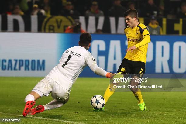 Christian Pulisic of Borussia Dortmund scores his team's second goal to make the score 2-0 during the UEFA Champions League Round of 16 second leg...