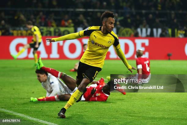 Pierre-Emerick Aubameyang of Borussia Dortmund celebrates scoring his team's fourth goal to make the score 4-0 and complete his hat-trick during the...