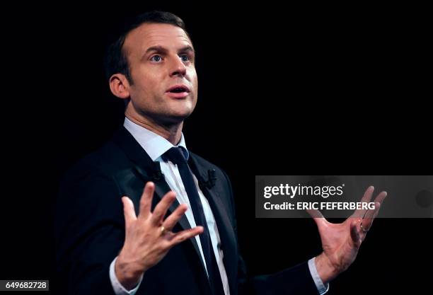 French presidential election candidate for the En Marche movement Emmanuel Macron speaks during an event organised by the collective "Elles Marchent"...