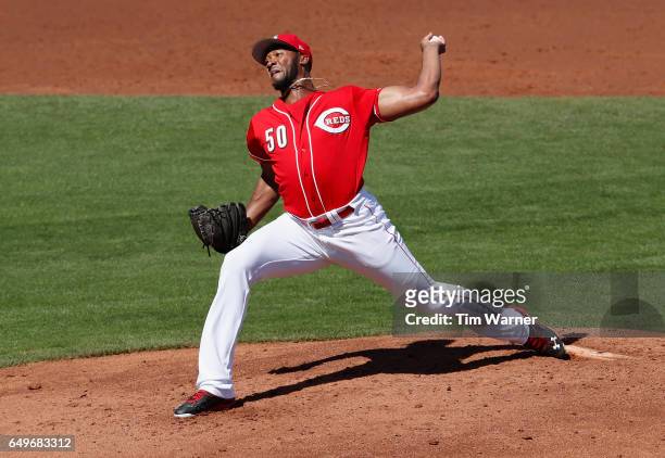 Amir Garrett of the Cincinnati Reds pitches in the first inning against the Los Angeles Angels during the spring training game at Goodyear Ballpark...