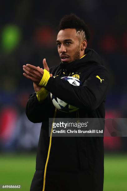 Pierre-Emerick Aubameyang of Borussia Dortmund celebrates with the match ball after his hat-trick at the end of the UEFA Champions League Round of 16...