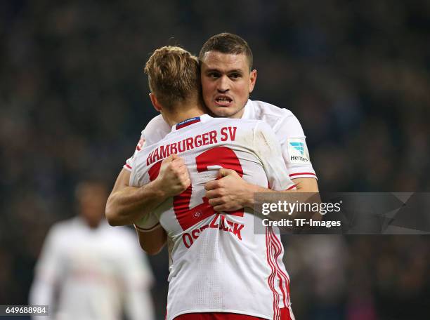 Matthias Ostrzolek of Hamburg and Kyriakos Papadopoulos of Hamburg looks on during the Bundesliga match between Hamburger SV and Hertha BSC at...