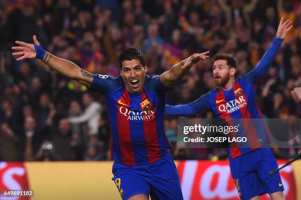 Barcelona's Uruguayan forward Luis Suarez celebrates after scoring the opener during the UEFA Champions League round of 16 second leg football match...