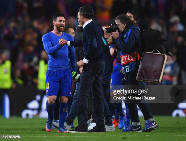 Luis Enrique manager of Barcelona celebrates victory with Lionel Messi after the UEFA Champions League Round of 16 second leg match between FC...