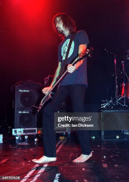 Krist Novoselic of Nirvana performs on stage at the Astoria Theatre, London, 5th November 1991.