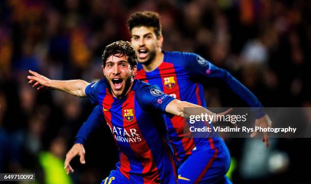 Sergi Roberto of Barcelona celebrates with his team mate Gerard Pique after scoring his team's six and final goal during the UEFA Champions League...