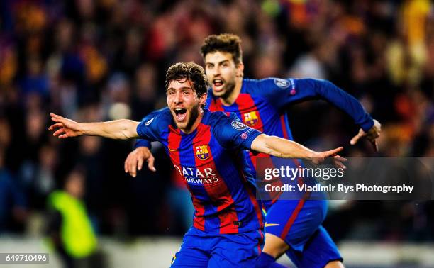 Sergi Roberto of Barcelona celebrates with his team mate Gerard Pique after scoring his team's six and final goal during the UEFA Champions League...