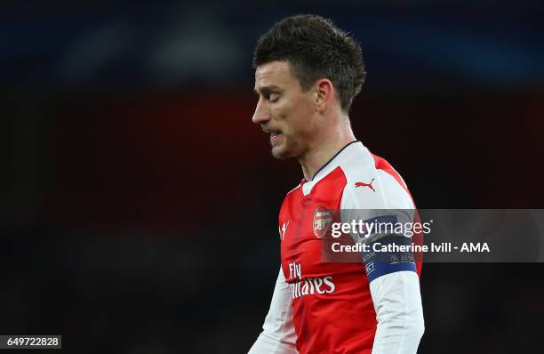 Laurent Koscielny of Arsenal looks dejected during the UEFA Champions League Round of 16 second leg match between Arsenal FC and FC Bayern Muenchen...