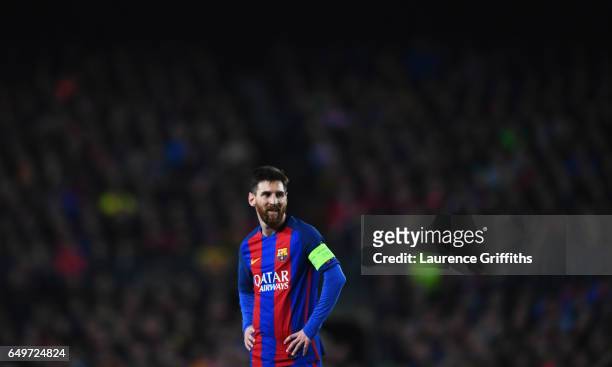 Lionel Messi of Barcelona looks on during the UEFA Champions League Round of 16 second leg match between FC Barcelona and Paris Saint-Germain at Camp...