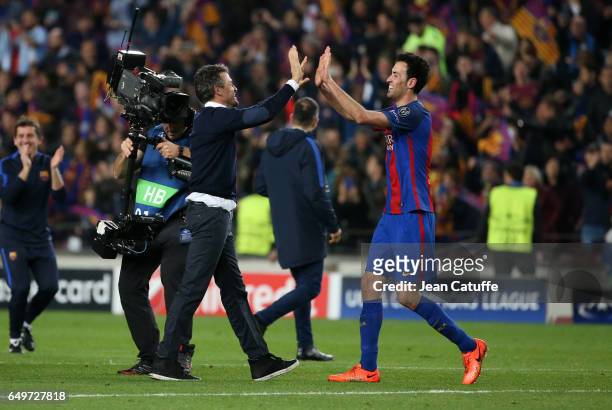 Coach of FC Barcelona Luis Enrique Martinez celebrates the victory with Sergio Busquets following the UEFA Champions League Round of 16 second leg...