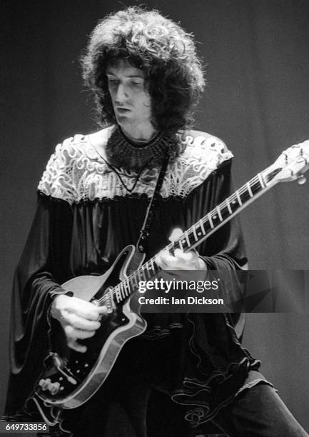 Brian May of Queen performs on stage on the 'Queen II' tour, Rainbow Theatre, London, 31 March 1974.