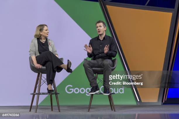 Pittman, senior vice president and chief product officer of eBay Inc., right, speaks as Diane Greene, senior vice president of cloud services at...