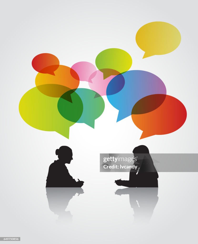 Two women in the discussion