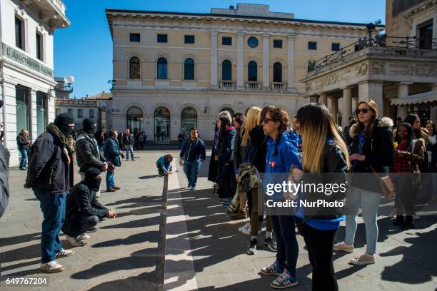 Flash mob in Padua, Italy, on March 8, 2017 to mark International Women's Day. The flashmob called &quot;Un Minuto di Rumore contro anni di...