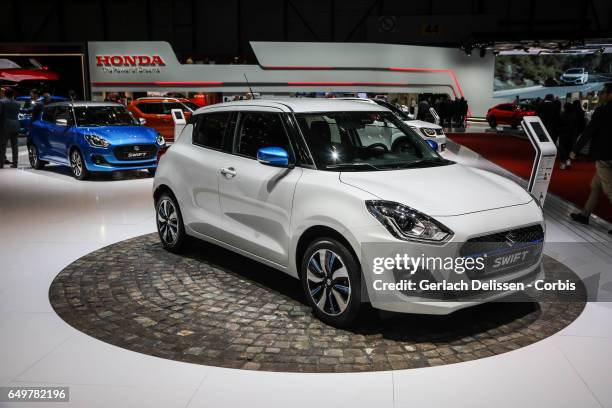 The new Suzuki Swift on display during the second press day of the Geneva Motor Show 2017 at the Geneva Palexpo on March 8, 2017 in Geneva,...