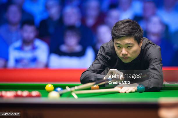 Ding Junhui of China plays a shot during the first round match against John Higgins of Scotland on day three of 2017 Ladbrokes Players Championship...