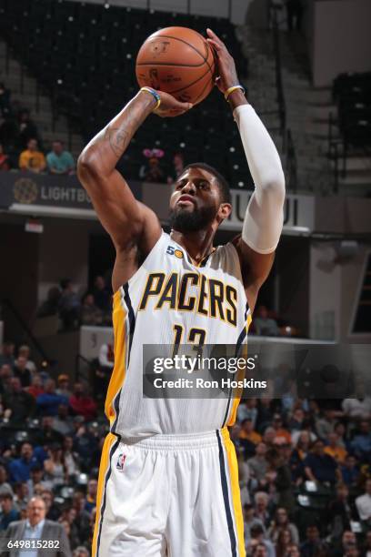 Paul George of the Indiana Pacers shoots a free throw against the Detroit Pistons on March 8, 2017 at Bankers Life Fieldhouse in Indianapolis,...