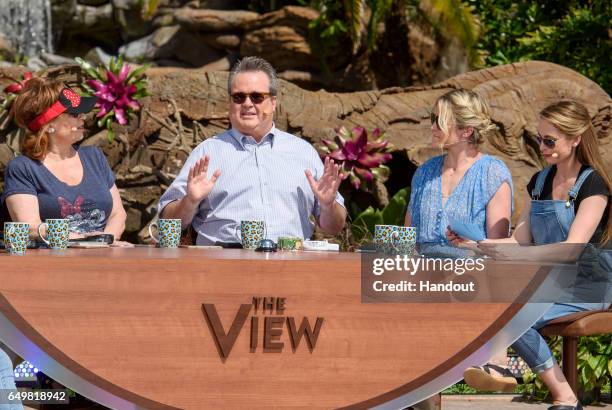 In this handout photo provided by Disney Resorts, hosts Joy Behar, Sara Haines and Jedediah Bila speak with guest Eric Stonestreet on ABC's "The...