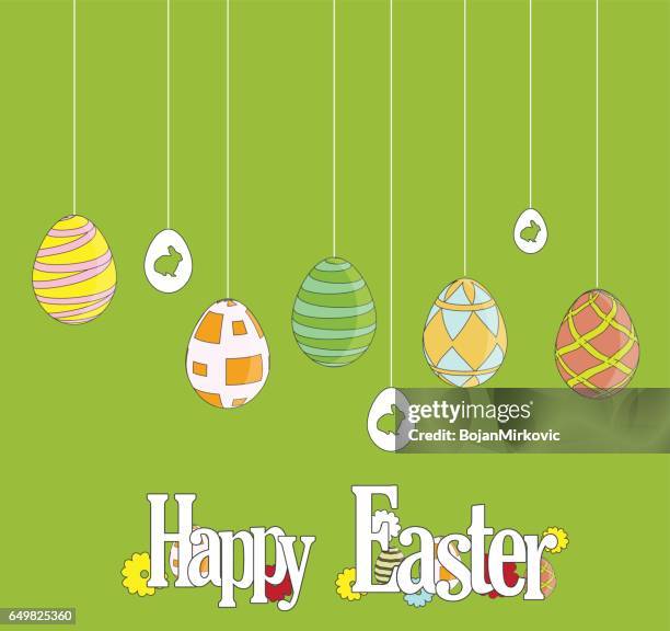 easter poster. hanging cute eggs on green background - decorative red easter egg stock illustrations