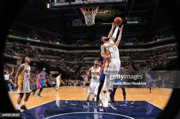 Paul George of the Indiana Pacers grabs the rebound against the Detroit Pistons on March 8, 2017 at Bankers Life Fieldhouse in Indianapolis, Indiana....