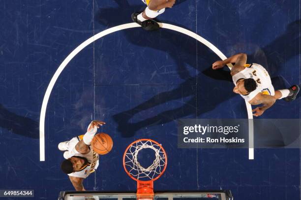 Paul George of the Indiana Pacers shoots the ball against the Detroit Pistons on March 8, 2017 at Bankers Life Fieldhouse in Indianapolis, Indiana....