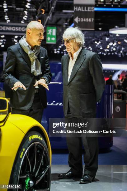 Fabio Filippini of Pininfarina talking to Bernie Ecclestone during the second press day of the Geneva Motor Show 2017 at the Geneva Palexpo on March...