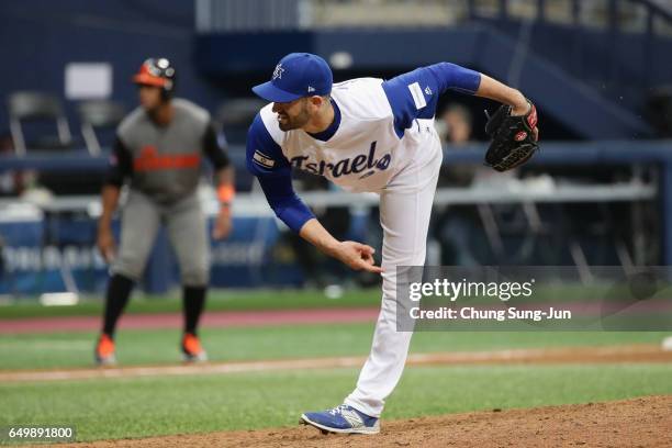 Pitcher Josh Zeid of Israel throws in the top of the eighth inning during the World Baseball Classic Pool A Game Five between Netherlands and Israel...