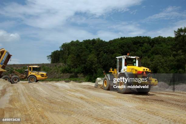 road construction in the country - watervaartuig stock pictures, royalty-free photos & images