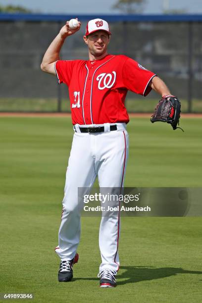 Max Scherzer of the Washington Nationals throws the ball prior to the spring training game against the Boston Red Sox at The Ballpark of the Palm...