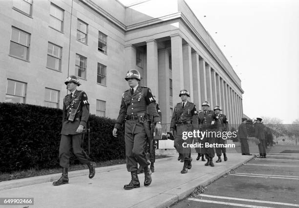 Military police move out to their posts at the Pentagon today. Thousands of antiwar demonstrators are pouring into the Nation’s Capital to march on...