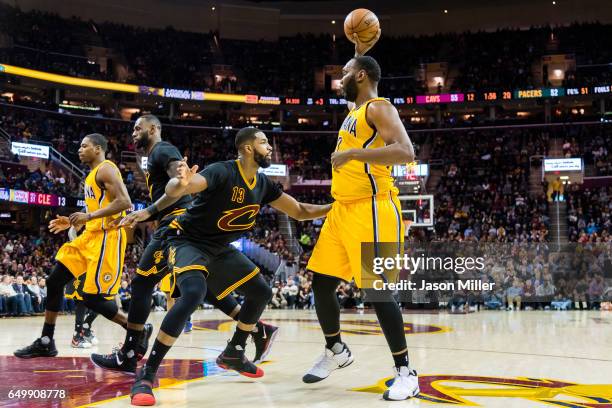 Tristan Thompson of the Cleveland Cavaliers guards Al Jefferson of the Indiana Pacers during the first half at Quicken Loans Arena on February 15,...