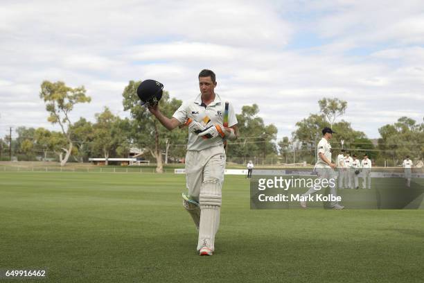 Chris Tremain of the Bushrangers acknowledges the applause as he leaves the field after scoring 111 during the Sheffield Shield match between...