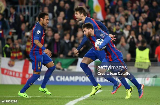 Lionel Messi of FC Barcelona celebrates scoring his penalty with Neymar Jr and Gerard Pique during the UEFA Champions League Round of 16 second leg...