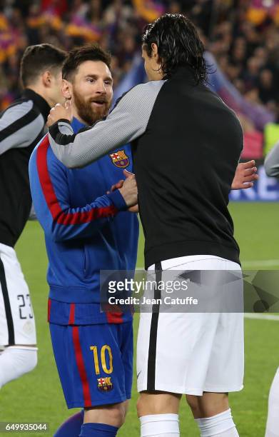 Lionel Messi of FC Barcelona greets Edinson Cavani of PSG before the UEFA Champions League Round of 16 second leg match between FC Barcelona and...