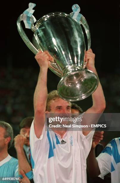 Rudi Voller, Olympique Marseille, celebrates with the cup after beating AC Milan