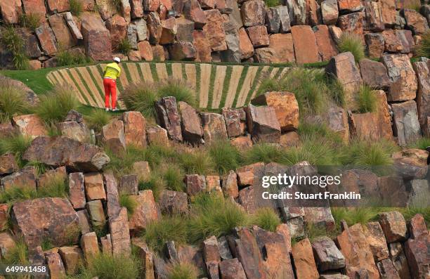 Richard T Lee of Canada plays a shot on the 17th hole during the first round of the Hero Indian Open at Dlf Golf and Country Club on March 9, 2017 in...