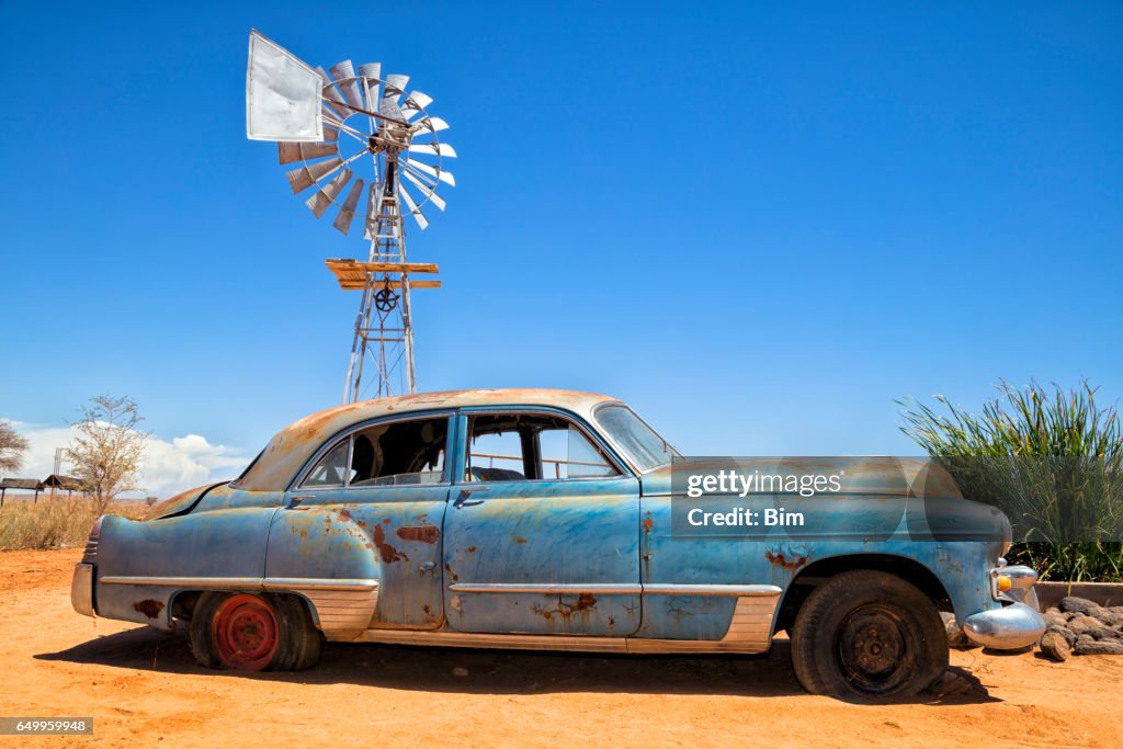 Abandoned vintage car in the desert