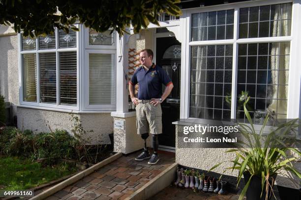 Former Royal Marine Commando Pete Dunning at home on March 2, 2017 in Wallasey, England. Former Royal Marine Commando Pete Dunning from Wallasey was...