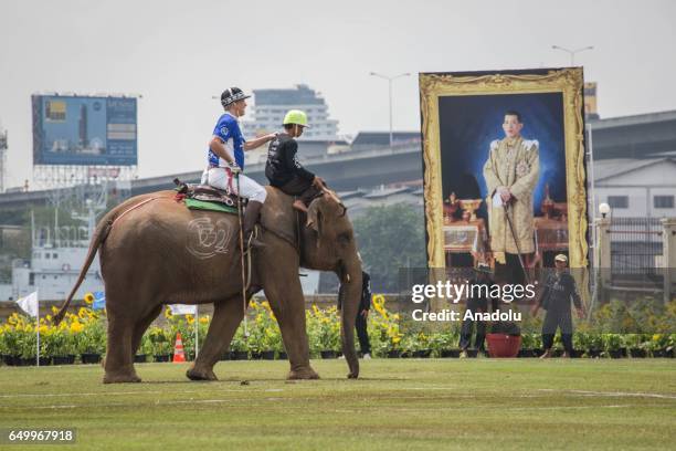 Polo player rides an elephant during the 2017 King's Cup Elephant Polo at Anantara Chaopraya Resort in Bangkok, Thailand on March 09, 2017. The...