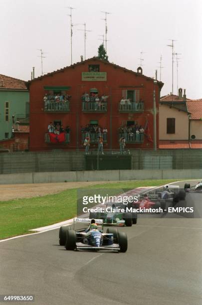 Williams' Ayrton Senna leads the slow parade behind the safety car