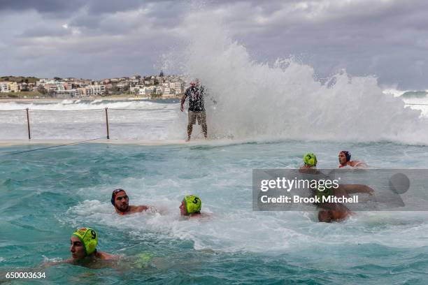 The referee is swamped by a large wave during Water Polo by the Sea at Bondi Icebergs on March 9, 2017 in Sydney, Australia.