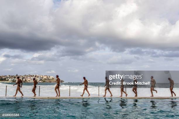 Teams gather for the start of Water Polo by the Sea at Bondi Icebergs on March 9, 2017 in Sydney, Australia. The event coincided with huge waves...