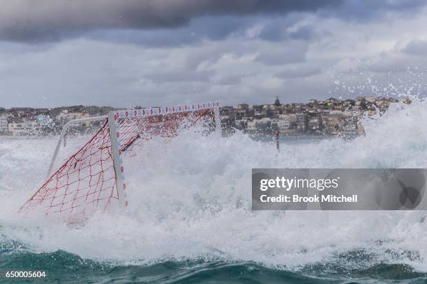 The goal is swamped by a huge wave during Water Polo by the Sea at Bondi Icebergs on March 9, 2017 in Sydney, Australia.