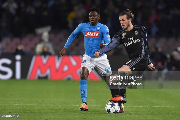 Amadou Diawara of SSC Napoli competes for the ball with Gareth Bale of Real Madrid CF during the UEFA Champions League match between SSC Napoli and...