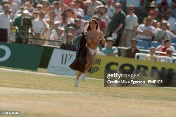 Streaker, Linsey Dawn Mckenzie, runs on the field in Manchester